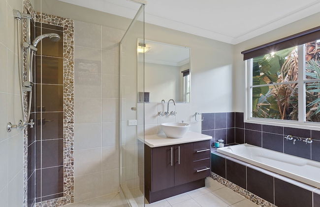 Resort Style Home near Airport & CBD - Photo 13