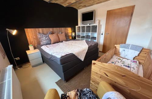 Wohnen im ehemaligen Kuhstall Stiehler Farm - Foto 16