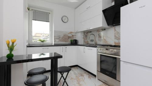 Elegant Warsaw Apartment with AC 550 m to Copernicus Science Centre by Noclegi Renters - Foto 5, stove, minibar