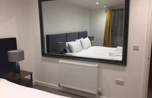 Relax in style at my stunning Holywell Beach home - Foto 21