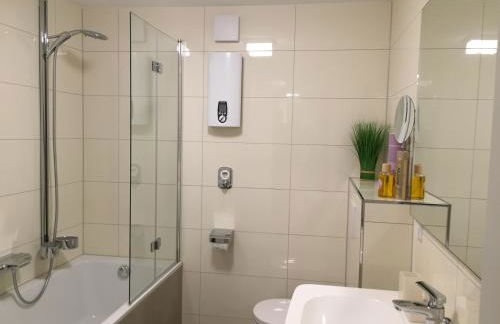 Apartment - zentrumsnah, eigener Parkplatz und großer Balkon ins Grüne - Foto 28