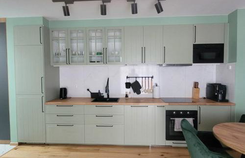 Zielony apartament w Wileńska Park i prywatne miejsce w garażu podziemnym - Photo 13