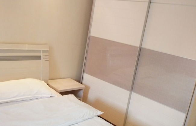 Dalian Xiuzhu Building Apartment - Foto 13