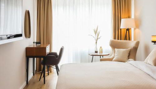 Hochwertige Ferienwohnung in ruhiger Lage mit eigener Terrasse und Parkplatz, nur 7 Gehminuten zum Strand entfernt - hoher Schlafkomfort dank Boxspringbett - Foto 2