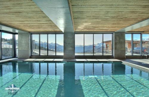 ARC 1600, LE RIDGE, Appartement 10 personnes Duplex Vue Montagne - ski aux pieds - Sauna, Hammam, Piscine, Salle de salle de sport-fitness - Foto 45
