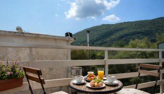 Karavaki apartments - Foto 5, Garden view, furniture, towels, stove, heating, toaster