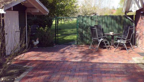 Ferienwohnung Aurich Sandhorst EG 2 Schlafzimmer mit Terrasse und Garten - Foto 2, Garden