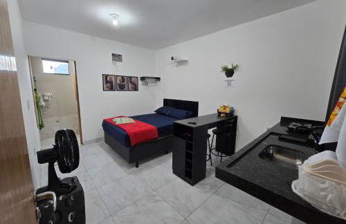 Flat completo 12 minutos do centro com lojas variadas - Foto 1