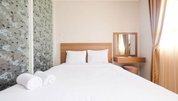 Warm and Homey 1BR Apartment at Atlanta Residences By Travelio - Foto 2, Habitación