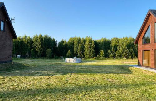 Rumiane Chatki - Domki z Jacuzzi i Basenem - Foto 11