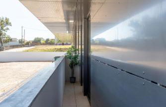 Sleek & Modern Flat w/ Private Garage by HostWise - Photo 32