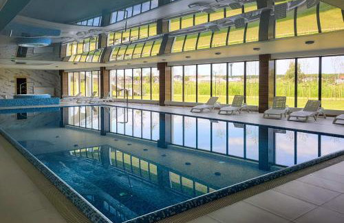 Bright Apartment Spadochroniarzy in Dziwnów with Parking & Pool by Noclegi Renters - Foto 3