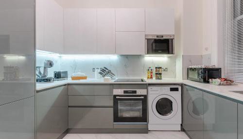 5H Modern Elegance 1-Bedroom City Living in London - Photo 4, stove, pet friendly, toaster, minibar