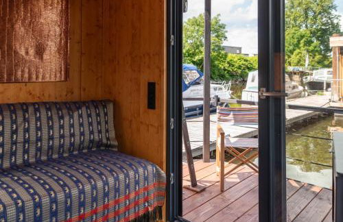 Tiny-Hausboot LIKEDEELER mit Dachterasse und Kamin - Foto 11