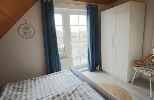 Nessmersiel, Ferienwohnung mit Balkon in Deichnähe, Wallbox, renoviert - Foto 9