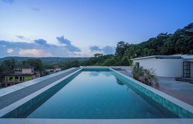 ELIVAAS Kamerios Verano 1 BHK with Pool - Photo 53