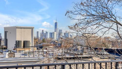 SkyHouse JC - New 3BR Apt with Private Rooftop - Foto 3