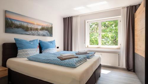 Ferienwohnung Strandgut - Foto 1, towels, wardrobe