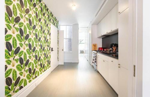 E10-2 Designer East Village Townhouse 1BR W D - Foto 38