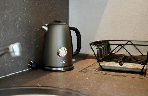 Stilvolle Wohnung mit Balkon & Parkplatz - Foto 25