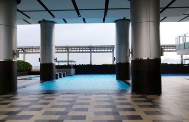 Comfy 1BR Apartment at Cosmo Terrace - Photo 33