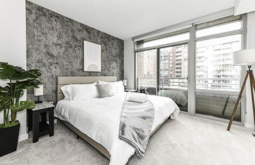 Comfy 2BR Oasis with Scenic Rooftop & Gym - Photo 65