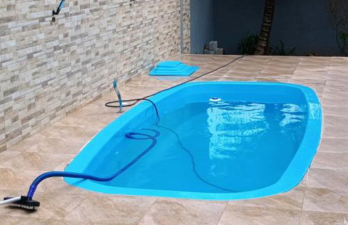 Casa aconchegante com churrasqueira e piscina para um ambiente familiar - Photo 7