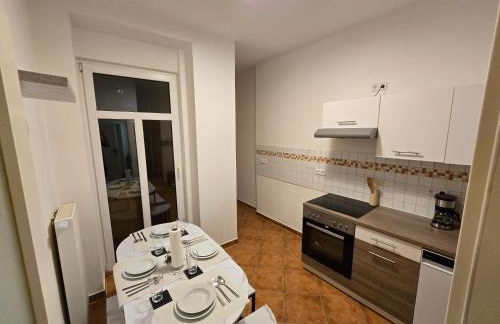 Boardinghouse mit 10 großen Apartments mit Parkplatz und Balkon - Photo 7