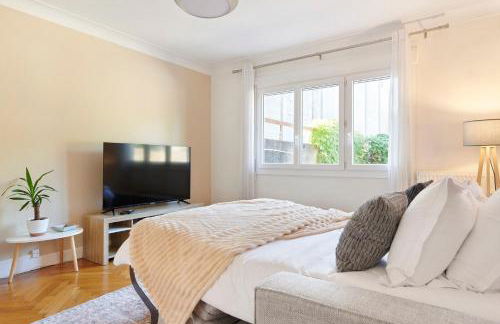 Les Capucines - Appt proche Talensac avec parking - Foto 24