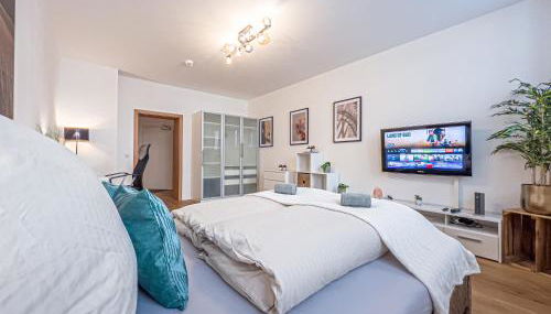 Gemütliche Ferienwohnung mit 2 Schlafzimmern, kostenfreiem Parkplatz, modernem Bad, Küche, Waschmaschine & Trockner - Foto 5