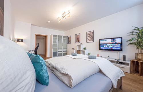 Gemütliche Ferienwohnung mit 2 Schlafzimmern, kostenfreiem Parkplatz, modernem Bad, Küche, Waschmaschine & Trockner - Foto 5