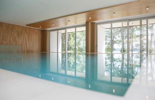 Stay Cozy - Apartment am See mit Pool und Sauna - Photo 12