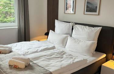 REMA Homes - 180x200 Bett Küche Bad 50'' TV Tiefgarage - Foto 11