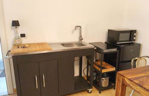 Romantic Attic Retreat with Panoramic Terrace, Steps from the Lake - Photo 13