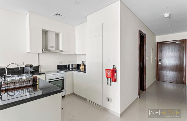 WelHome - Charming Breathtaking 1BR Apt. In Damac Hills - Photo 11