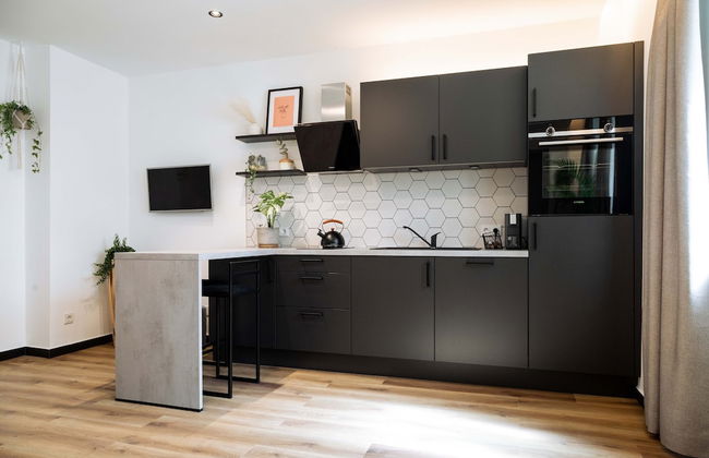 Urban Jungle Apartments - Photo 37