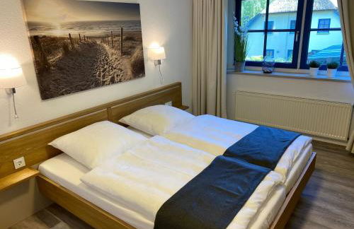 Familienfreundliches Reetdachhaus Weissdorn 2 - Foto 31