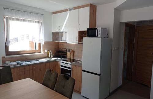 Domki u Eweli CAŁOROCZNE ogrzewane kominkiem - Photo 5