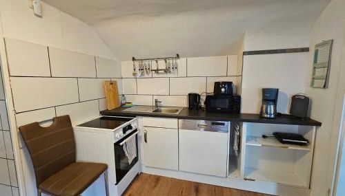Gepflegte Monteurwohnung in Rommerskirchen - Foto 2, stove, dishwasher, toaster