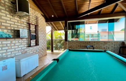 Casa espaçosa com sala de jogos interna e externa - Photo 47