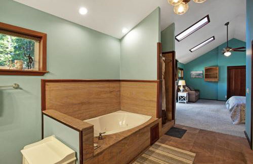 Tree-lined Home with Hot Tub Firepit & Large Yard - Photo 18