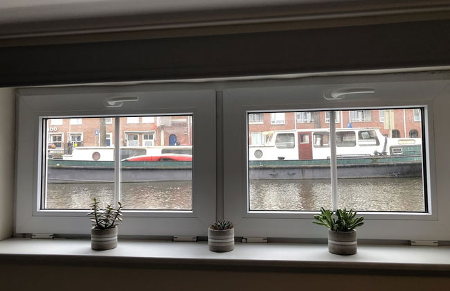 Slapen in eigentijds woonboot hotel - Foto 20