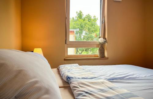 Amber Ferienhain - Ferienhaus 'Kirsche' mit verwunschenem Garten & privater Sauna - Foto 28