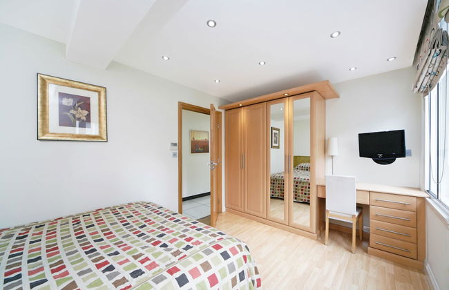 Baker Street Suites - Photo 23