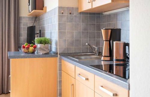 Antares Spiekerooger Gästehaus-Sonnengartenbalkon Süd mit Blick aufs Wattenmeer - Wohnung 7 - Foto 9