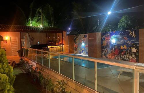 Linda casa com piscina, quiosque e churrasqueira a 150 metros da praia - Foto 23