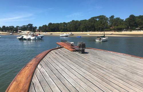 Aux pieds des plages, du port, de la piste cyclable et des commerces de proximité, un studio au dernier étage avec une vue panoramique sur le Bassin d'Arcachon, entièrement rénové, dans une résidence avec piscine - Foto 52