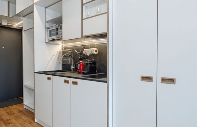 TopFloor Apartments - Photo 18