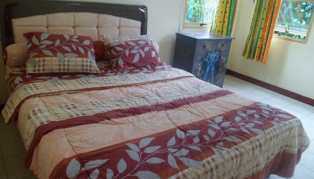 Kota Bunga CC - Foto 3, Habitación