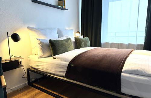 Design Apartment mit Blick auf Freiburg - Foto 10